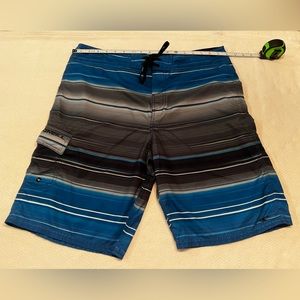 O’Neill used blue , gray and black stripes board shorts great  condition size 34